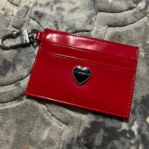 Betsey Johnson’s Card Holder with a ring to attach to the inside of your purse